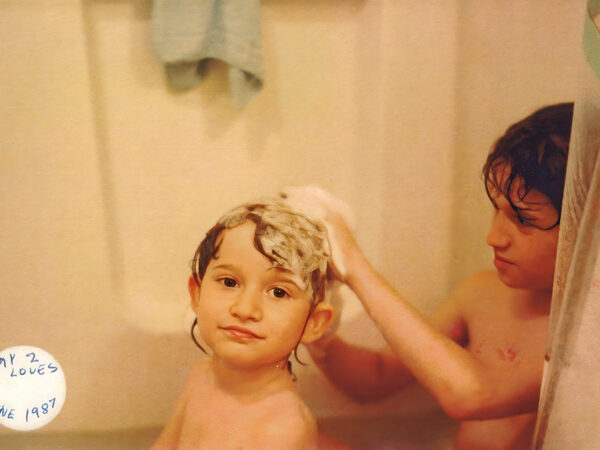 Noah shampooing Jared age 4
