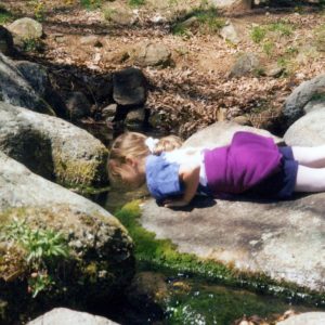 Alia drinking Peaks of Otter Big Spring